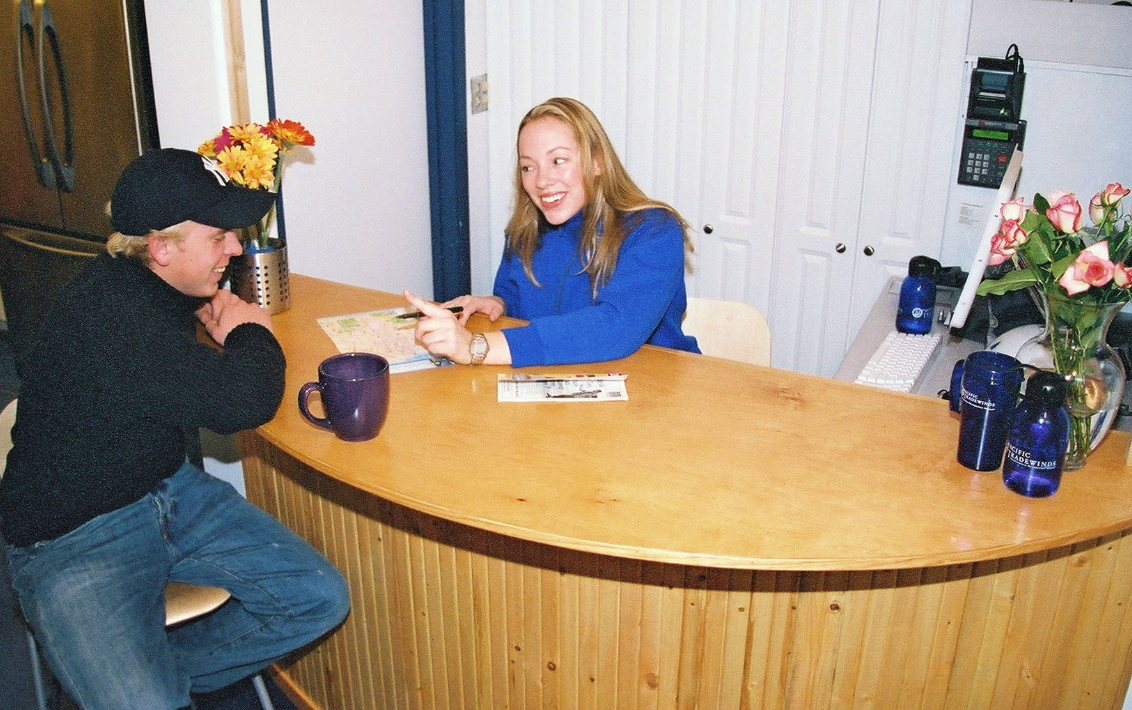 Reception Desk, Staff showing guest map