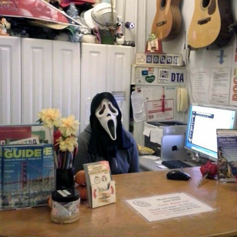 Unfriendly Scary Receptionist at Hostel Front Desk