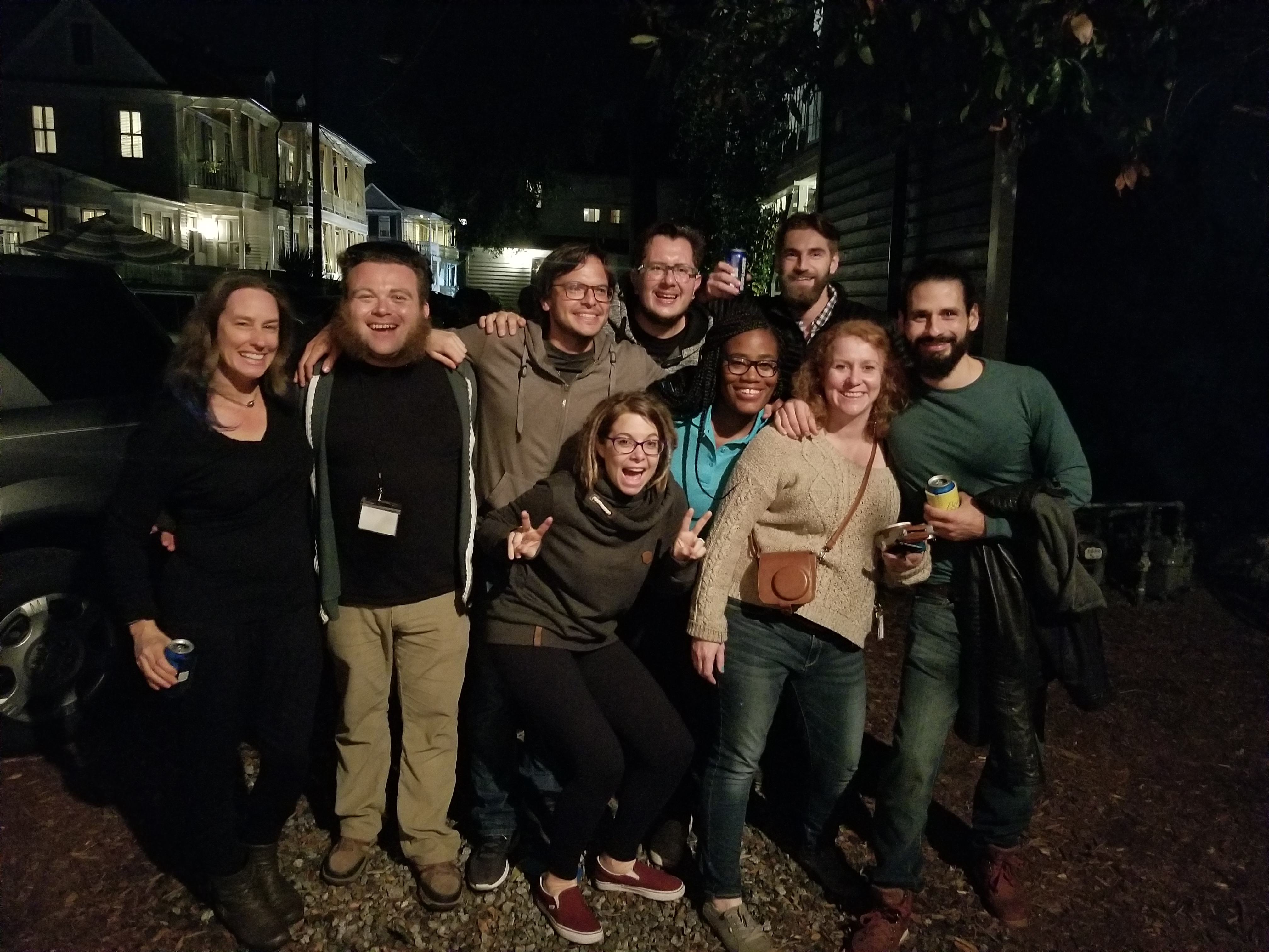 group of friends outside at night