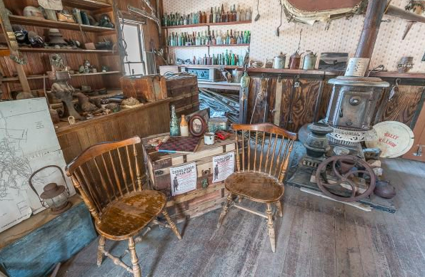 inside the Cerro Gordo Hostel, chairs, dust, Old West 