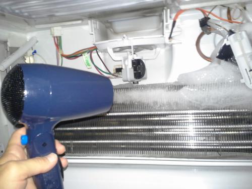 manually defrosting hand dryer freezer ice