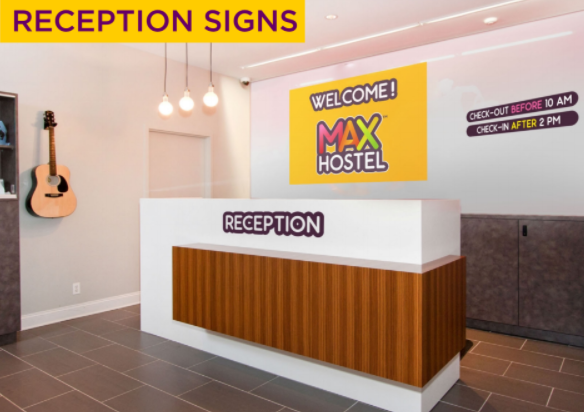 An example of a reception area at a MAX hostel with branding signs