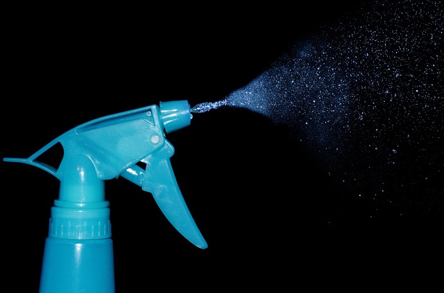 Spray Cleaner on dark background