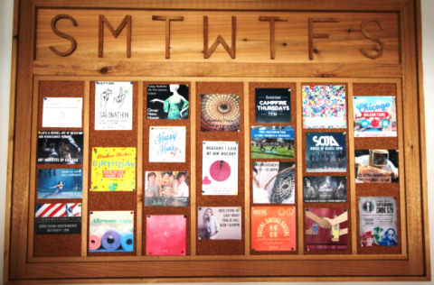 A hostel showing 7 days of activities hostel ativity board wooden days of week events