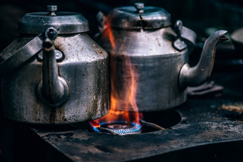 Kettles Heating Kettles on StoveTop Fire
