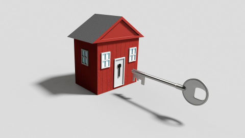 red cartoon house with key going in