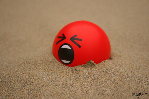Sometimes stress has us like ahhh! Red squishy stress ball with angry face