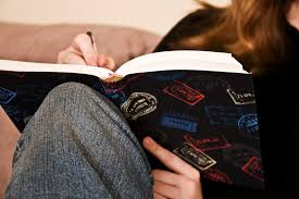 travel writing pen book notebook hand leg travel-writing-pen-book-notebook-hand-leg
